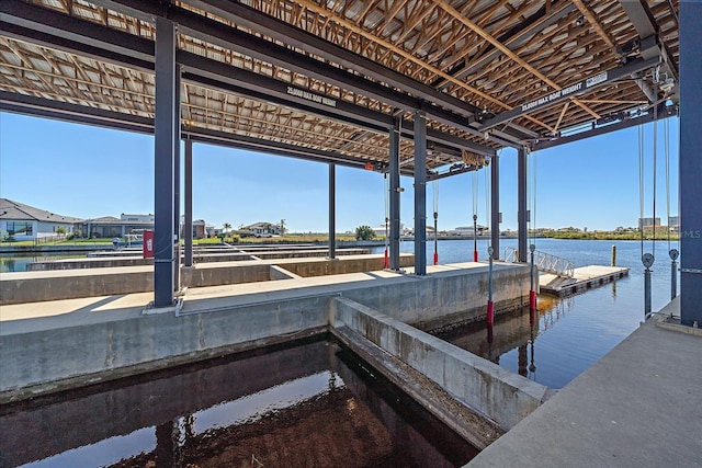 dock area with a water view