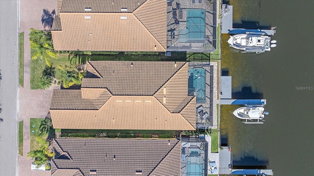 drone / aerial view featuring a water view