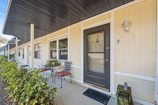 entrance to property with a porch