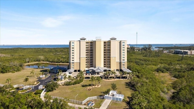 view of building exterior with a water view