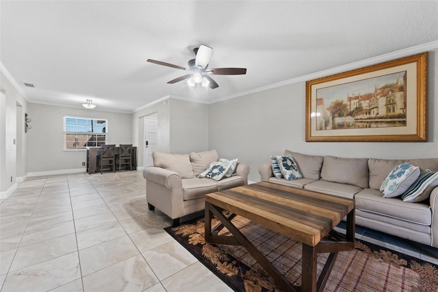 living room featuring ceiling fan and crown molding