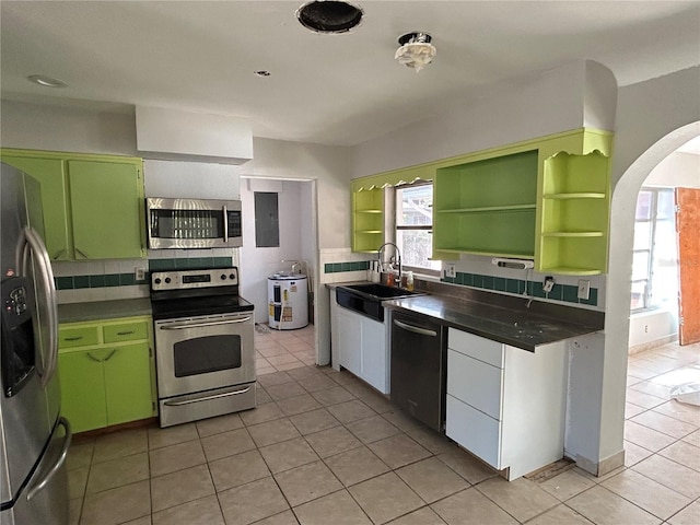 6035 Grand Blvd, New Port Richey, FL 34652 - kitchen featuring stainless steel appliances, backsplash, open shelves, and a sink