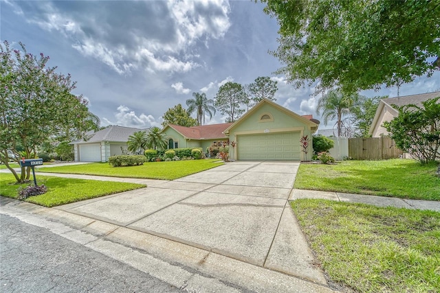 view of front of house featuring a garage and a front yard