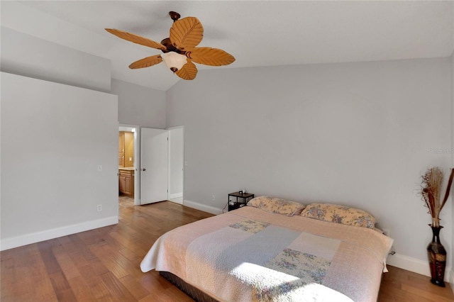 bedroom featuring ceiling fan, high vaulted ceiling, dark wood-type flooring, and baseboards