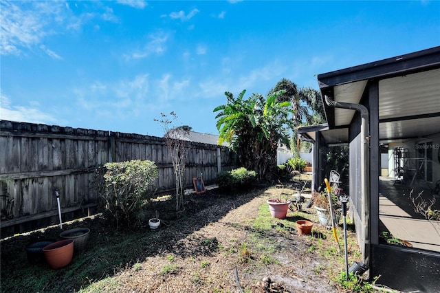 view of yard with a fenced backyard