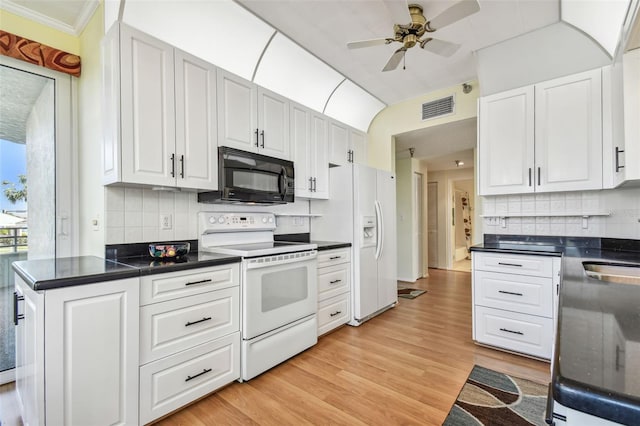 kitchen with decorative backsplash, white cabinetry, white appliances, and light wood-type flooring