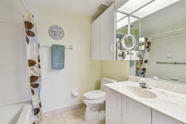 full bathroom featuring tile patterned flooring, vanity, shower / tub combo with curtain, and toilet