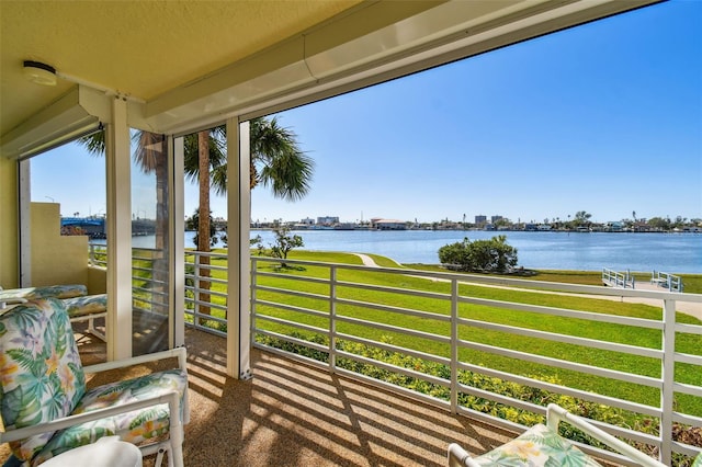 balcony featuring a water view