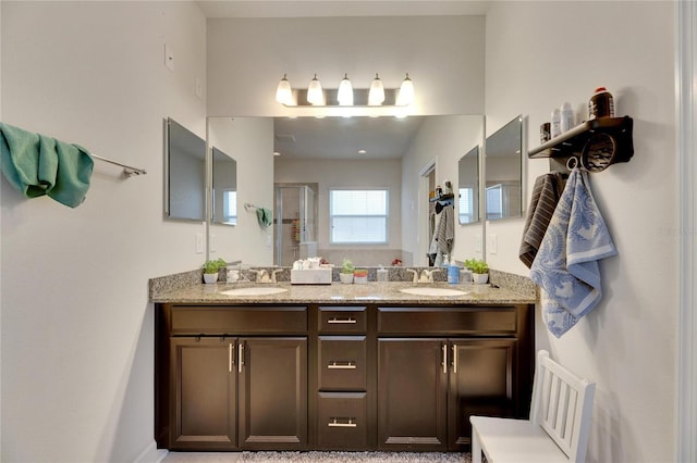 bathroom featuring vanity and walk in shower