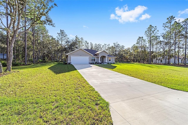 ranch-style home featuring a front lawn and a garage