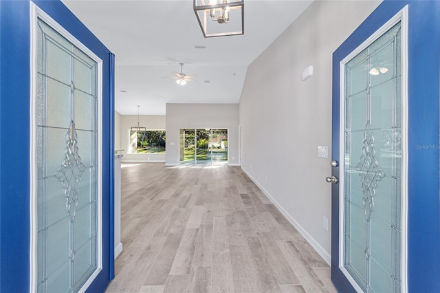 entryway featuring ceiling fan and light hardwood / wood-style flooring