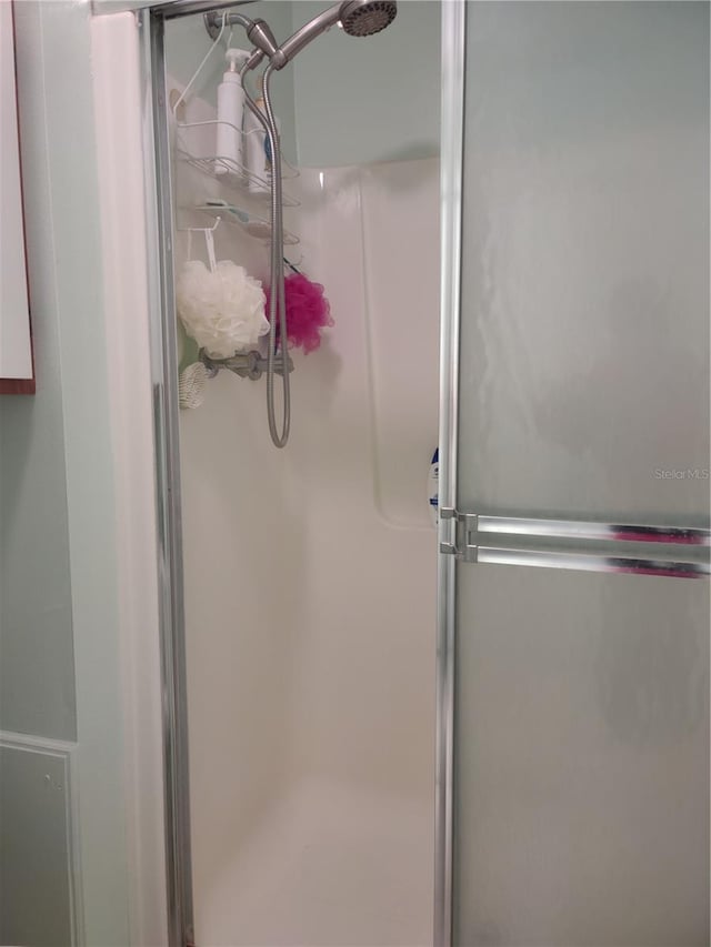 bathroom featuring walk in shower