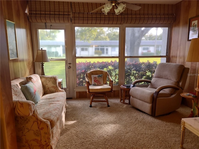 sunroom / solarium with ceiling fan and plenty of natural light