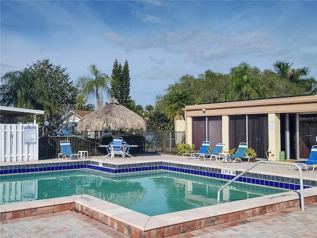 view of swimming pool featuring a patio area