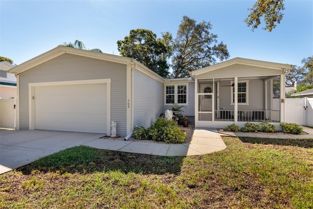 ranch-style house with a front lawn and a garage