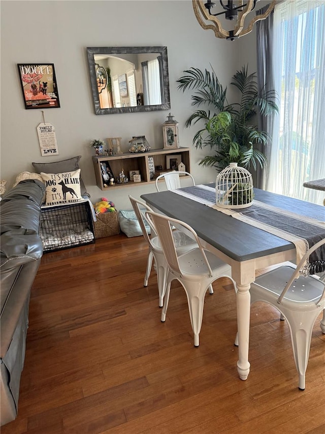 dining room with hardwood / wood-style floors