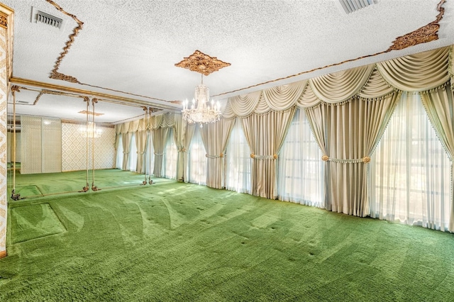 interior space featuring carpet flooring, a textured ceiling, and a notable chandelier