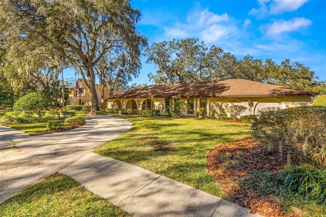 view of front of home with a front lawn