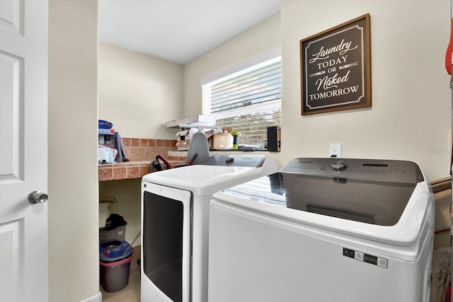 laundry area featuring separate washer and dryer