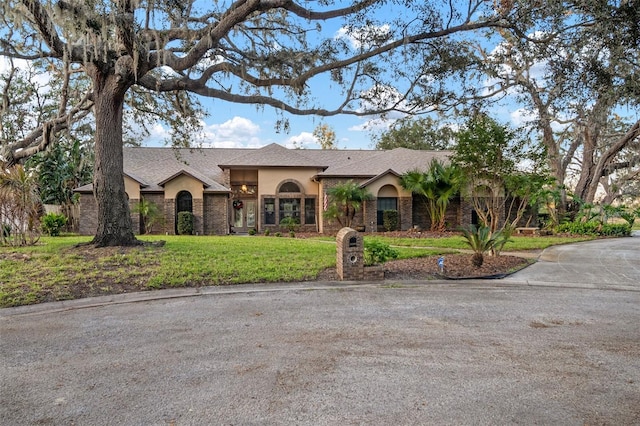 view of front of home with a front yard