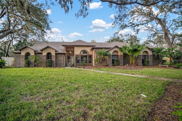 view of front of house with a front lawn