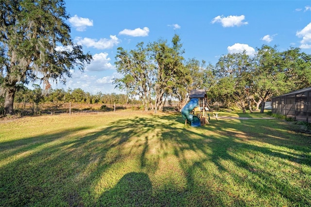 view of yard with a playground