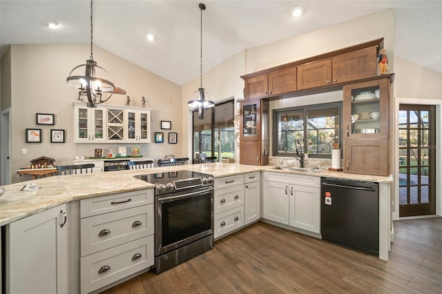 kitchen with electric range, dishwasher, vaulted ceiling, and sink