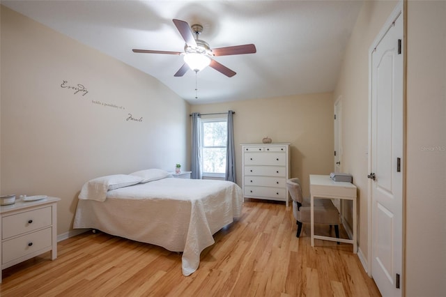 bedroom with ceiling fan and light hardwood / wood-style flooring