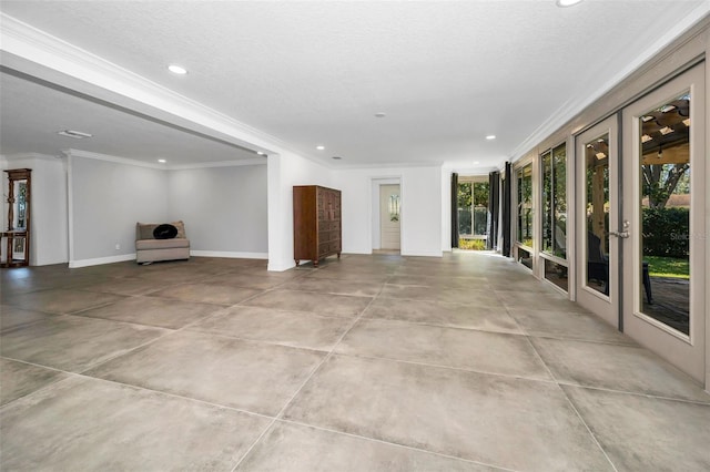 unfurnished living room with recessed lighting, a wealth of natural light, and crown molding