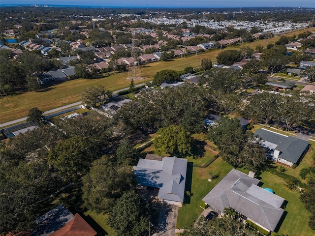 birds eye view of property with a residential view