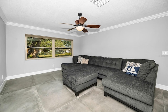 living room featuring baseboards, visible vents, a ceiling fan, a textured ceiling, and crown molding