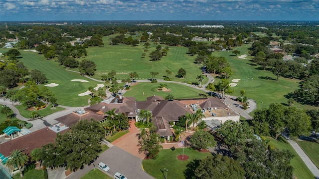 birds eye view of property featuring view of golf course and a residential view