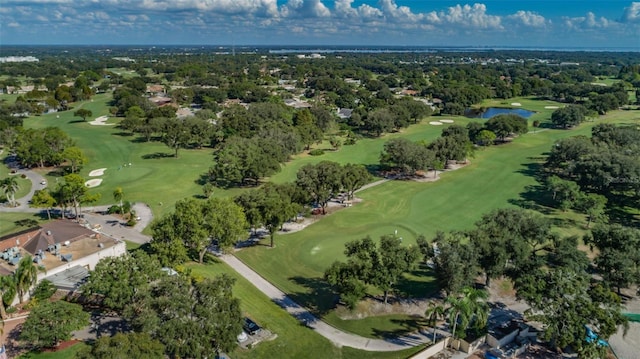 aerial view featuring view of golf course and a water view