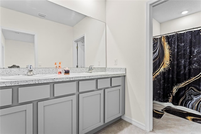 bathroom featuring vanity and tile patterned floors