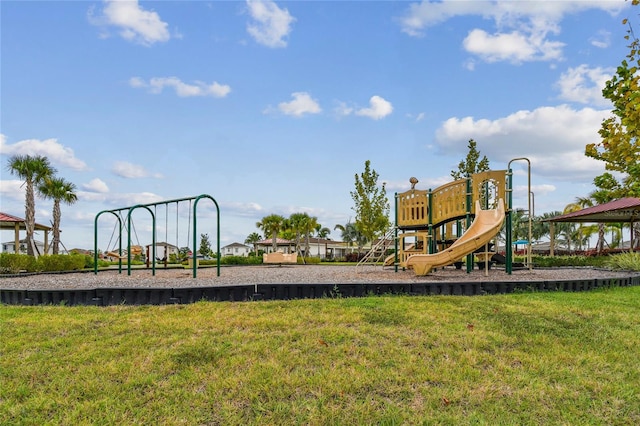 view of jungle gym featuring a lawn