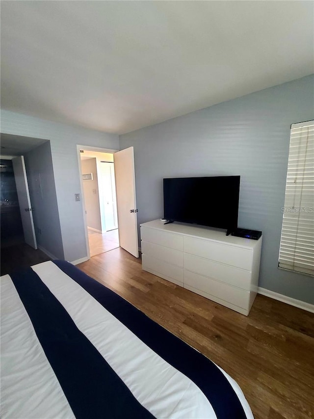 unfurnished bedroom featuring wood-type flooring