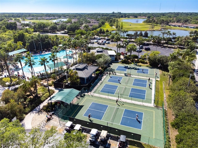 birds eye view of property with a water view