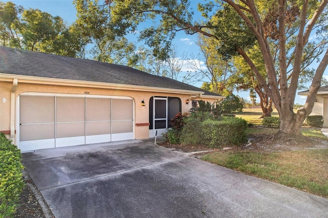 single story home with a garage