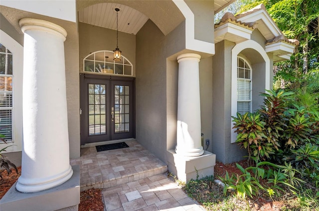 entrance to property featuring french doors