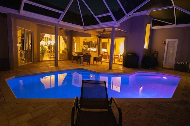 view of pool featuring ceiling fan and a patio area