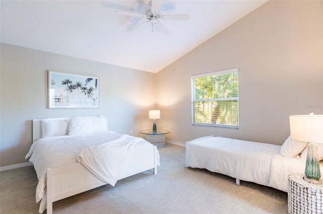 bedroom with carpet, high vaulted ceiling, and ceiling fan