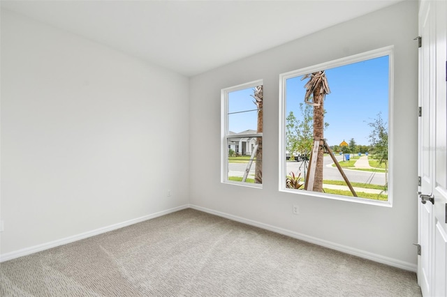 view of carpeted spare room