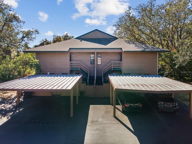 view of property exterior with a carport