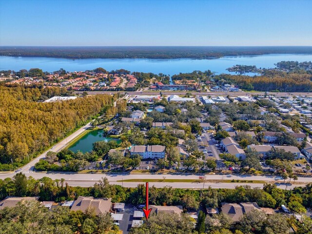 drone / aerial view with a water view