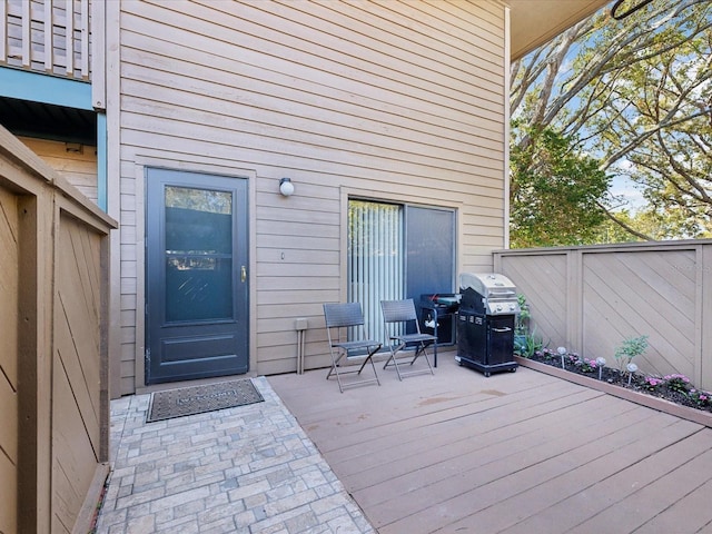 wooden terrace with grilling area