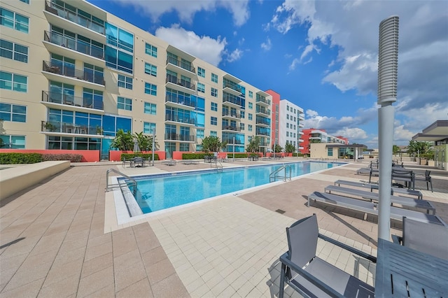 view of pool with a patio area