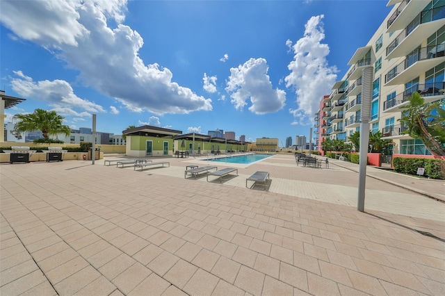 view of swimming pool featuring a patio