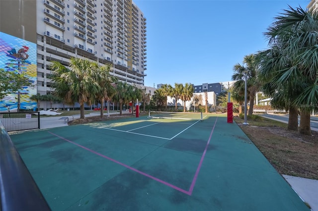 view of sport court featuring basketball hoop