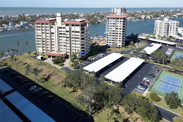 birds eye view of property with a water view