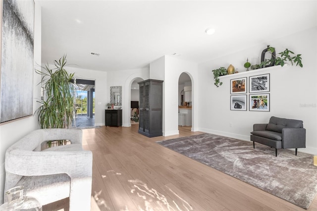 interior space with hardwood / wood-style floors